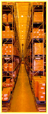 High bay very narrow aisle storage in wire guided aisle serviced with an EK turret forklift