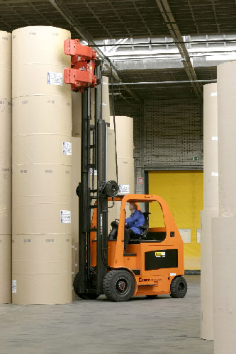 Bulk storage of paper rolls handled with a forklift clamp attachment