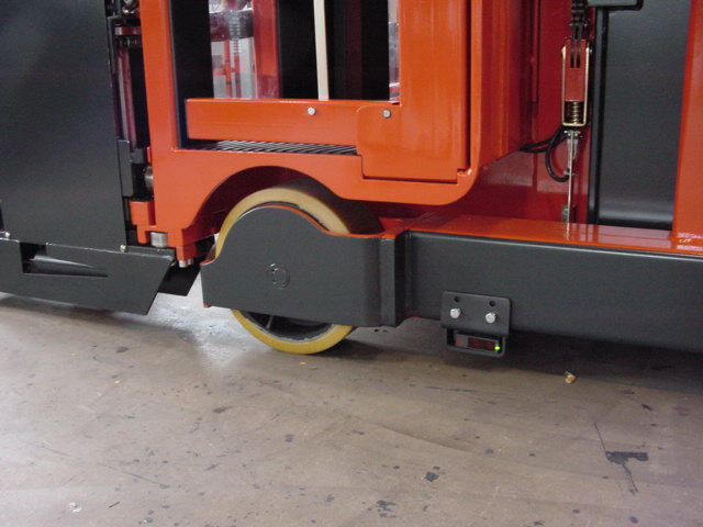 Wheel well cut out provides optimum cab entry height