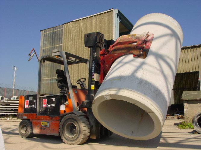 Clamp forklift with large cement pipe