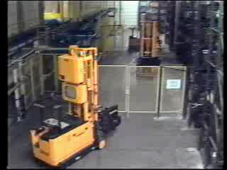 Warehouse automation with driverless turret trucks