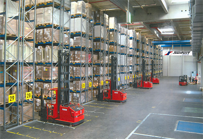 High bay very narrow aisle storage facility with Steinbock turret forklifts